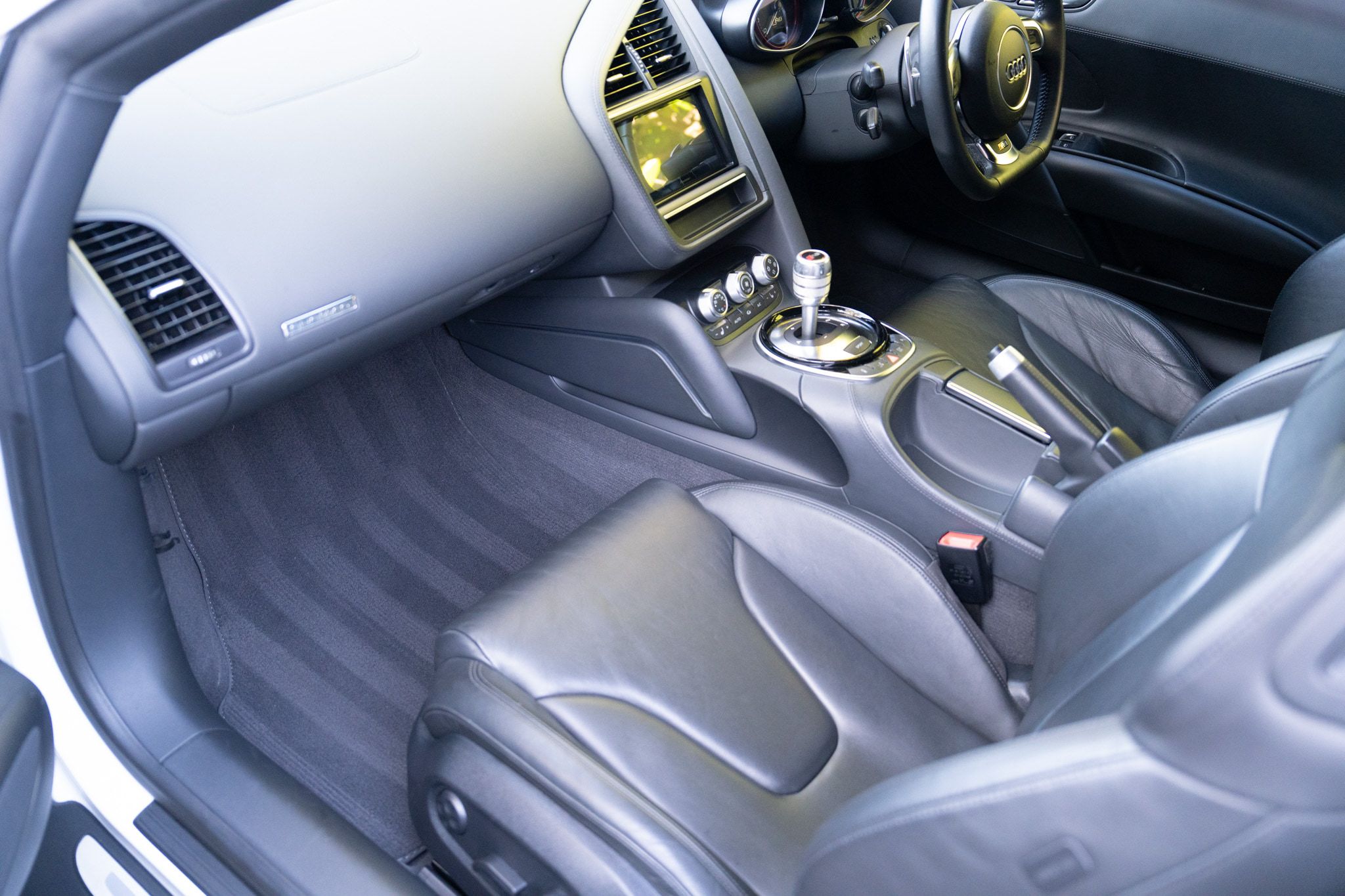 Audi R8 V10 seats, console and carpets after an interior detail